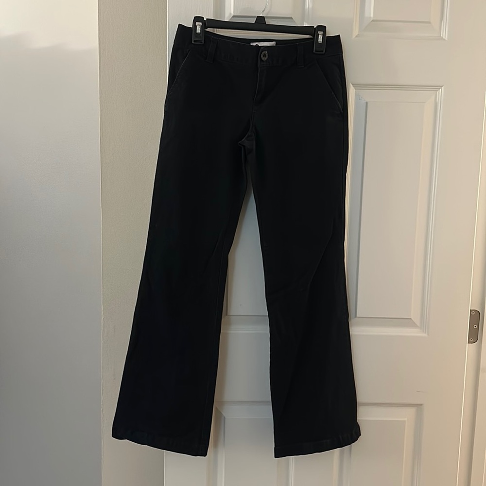 So black work pants with a flare. Size 7, juniors, from Kohls.
